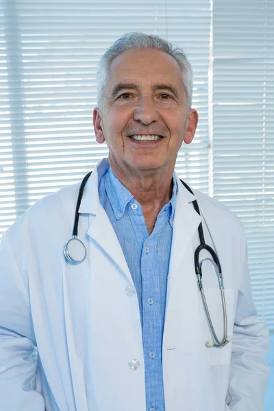 Smiling doctor in clinic Stock Photo