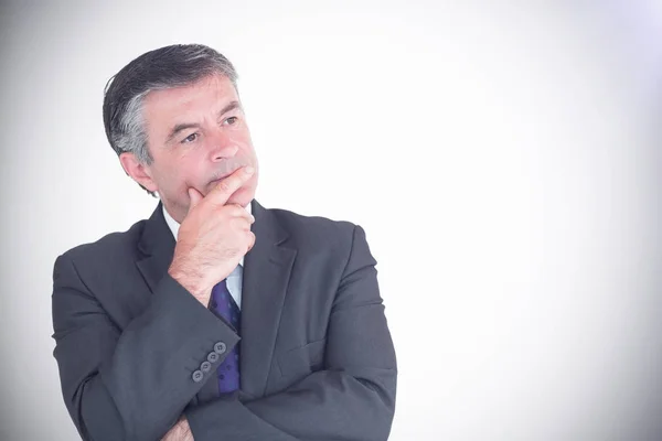 Businessman looking thoughtful — Stock Photo, Image