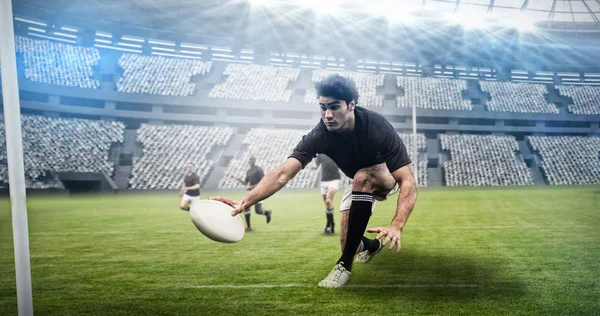 Jugadores de rugby entrenando en el campo —  Fotos de Stock