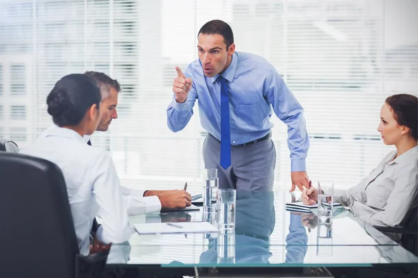 Angry executive pointing out his employee — Stock Photo, Image