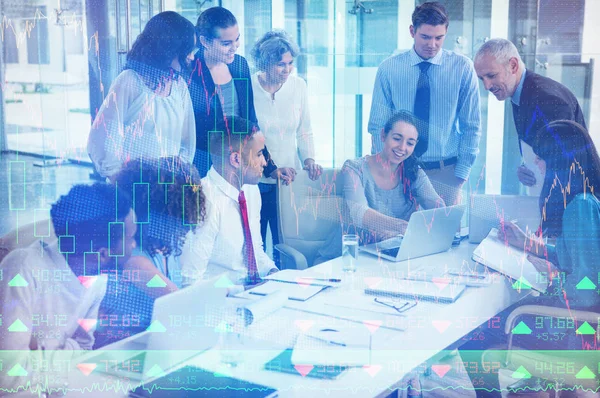 Business people discussing over laptop — Stock Photo, Image