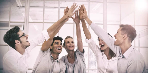 Group therapy in session sitting in a circle high fiving — Stock Photo, Image