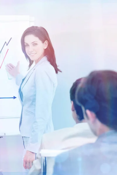 Businesswoman reporting sales figures — Stock Photo, Image