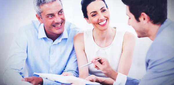 Business people talking together on sofa — Stock Photo, Image