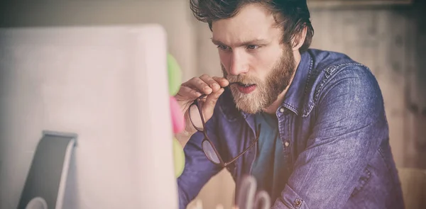 Focused hipster working at his desk — Stock Photo, Image