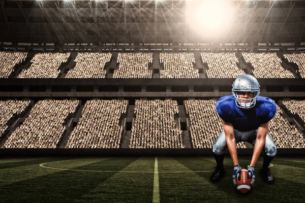 American football player placing ball — Stock Photo, Image