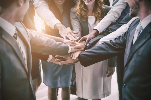 Business people with stacked hands — Stock Photo, Image