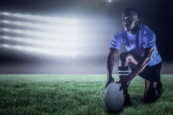 Rugby player holding ball — Stock Photo, Image