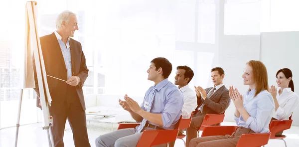 Business people applauding at the end of a conference — Stock Photo, Image