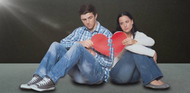 couple sitting on floor with broken heart clipart
