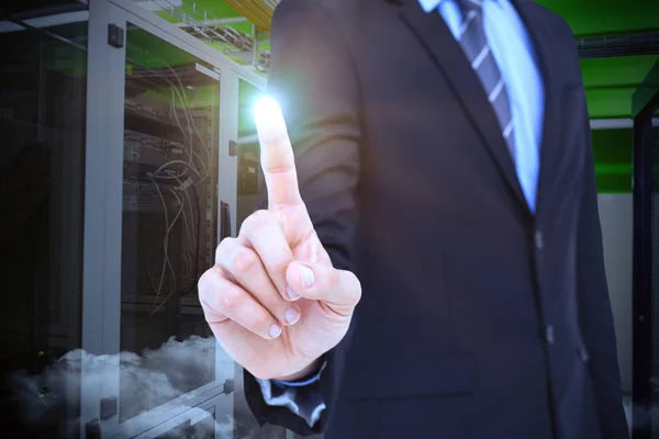 Composite image of mid section of businessman pointing something up — Stock Photo, Image