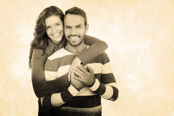 Happy young couple embracing — Stock Photo, Image