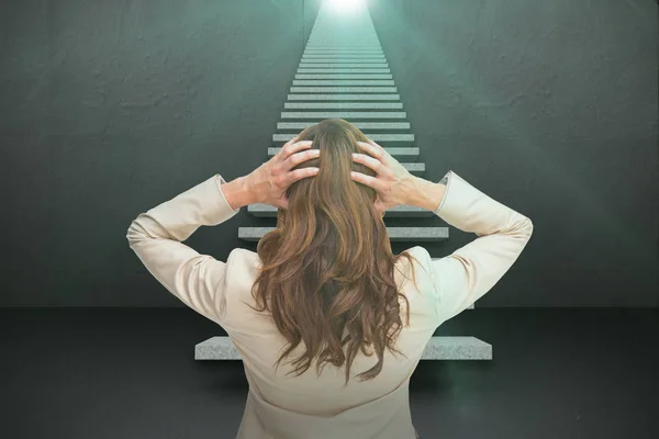 Young classy businesswoman with hands on head standing back to camera 3d — Stock Photo, Image