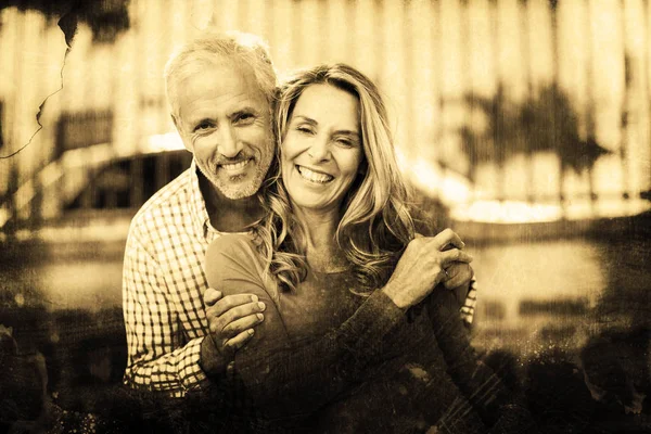 Mature couple standing on city street — Stock Photo, Image