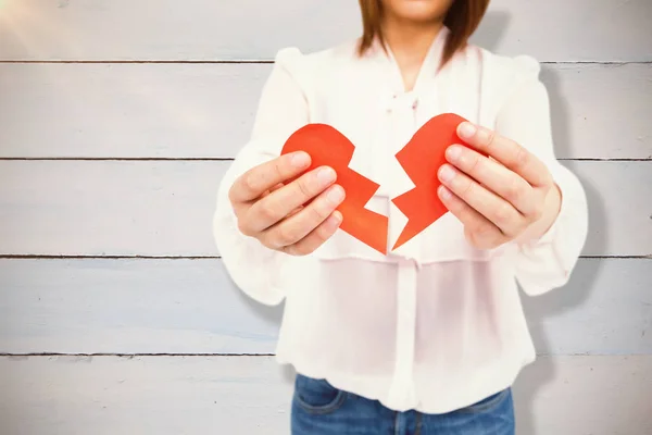 Woman holding broken heart paper — Stock Photo, Image