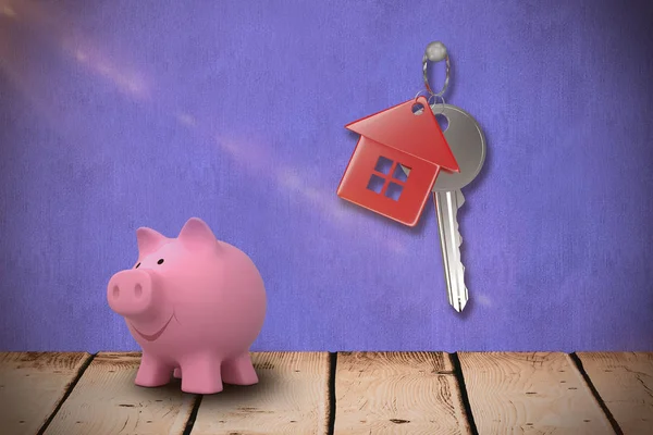 Schlüssel und rosa Sparschwein — Stockfoto