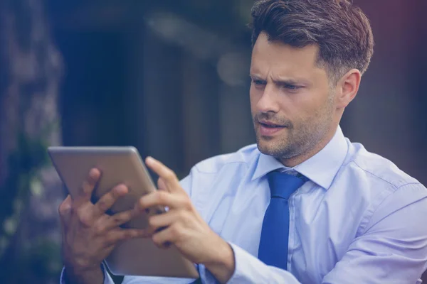 Close up of businessman using digital tablet — Stock Photo, Image