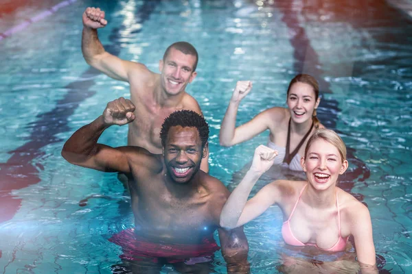 Fit people cycling in pool — Stock Photo, Image