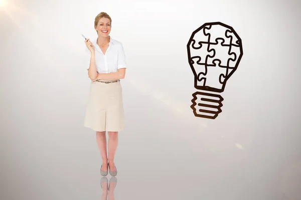 Thinking businesswoman against idea — Stock Photo, Image