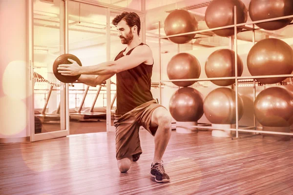 Man doing exercise with medicine ball — Stock Photo, Image