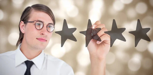 Kompositbild eines geekigen Geschäftsmannes, der mit Stift schreibt — Stockfoto