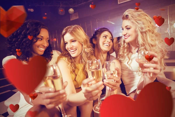 Girls holding champagne glasses — Stock Photo, Image