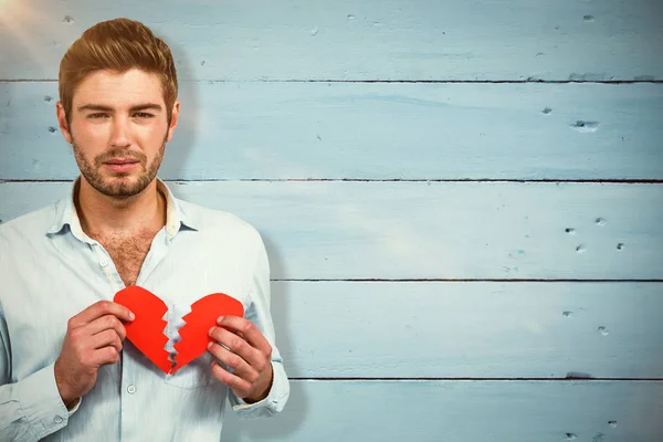 Verdrietig man met hart helften — Stockfoto