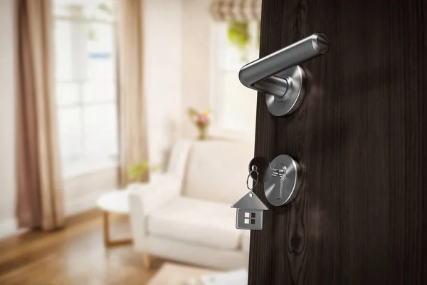 Open door with doorknob and key — Stock Photo, Image