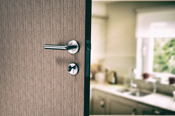 Brown door with house key — Stock Photo, Image