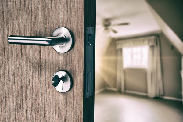 Brown door with house key — Stock Photo, Image