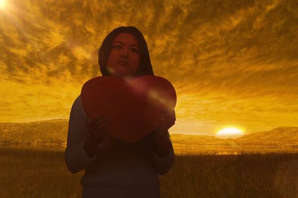 Aziatische vrouw met papier hart — Stockfoto