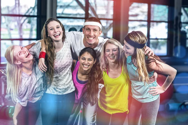 Smiling dancer group posing together