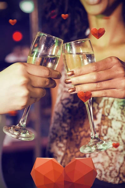 Hand toasting champagne glasses — Stock Photo, Image