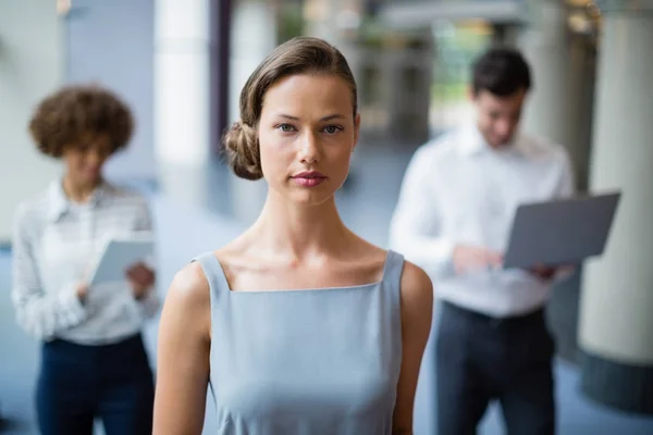 Confident businesswoman at conference centre — Stock Photo, Image