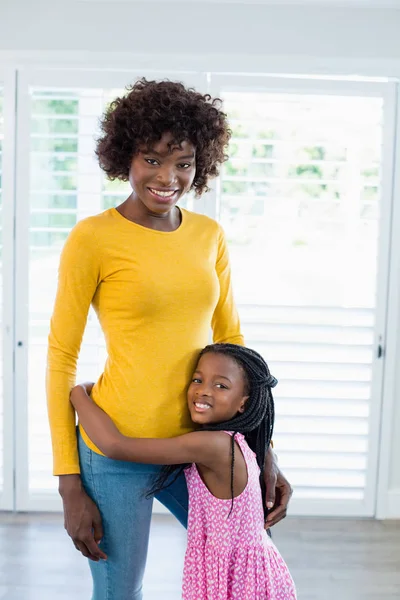 Portrait of daughter embracing her mother — Stock Photo, Image