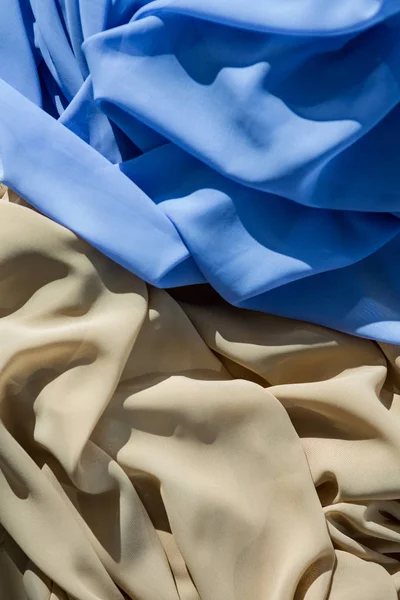 Zbliżenie: niebieski i beżowy tkaniny — Zdjęcie stockowe