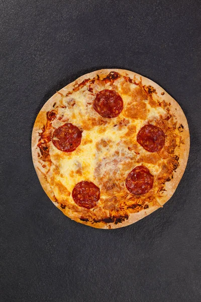 Delicious italian pizza served on grey background — Stock Photo, Image