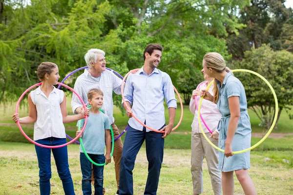 Multi-generation family pulling a rope — Stock Photo, Image