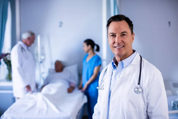 Portrait of male doctor smiling in the ward — Stock Photo, Image