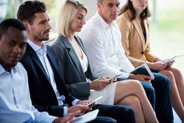 Business executives using digital tablet — Stock Photo, Image