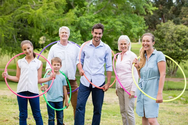 Multi-generation family pulling a rope — Stock Photo, Image