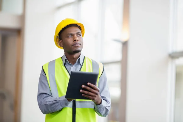 Architect using a digital tablet — Stock Photo, Image