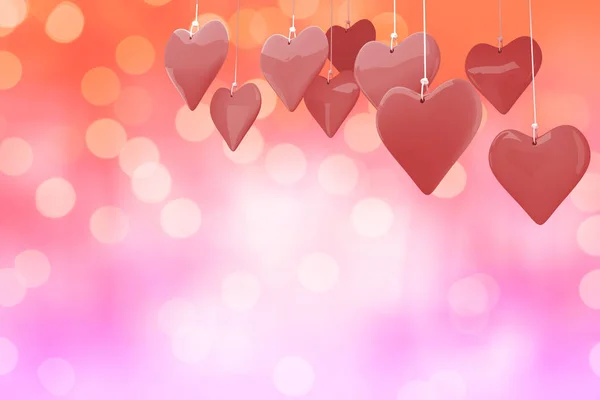 Älskar hjärtan mot glödande bakgrund — Stockfoto