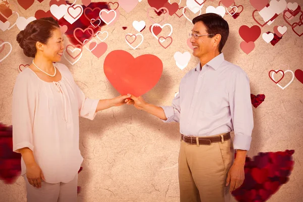 Più vecchio asiatico coppia holding cuore — Foto Stock