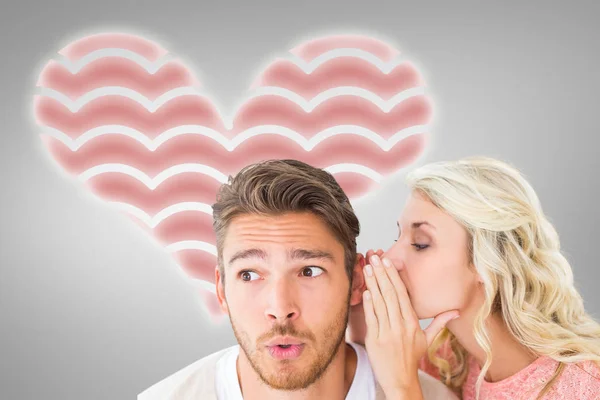Blonde whispering secret to boyfriend — Stock Photo, Image