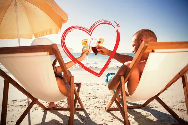 Couple clinking their glasses — Stock Photo, Image