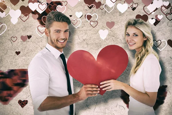 Couple holding red heart — Stock Photo, Image