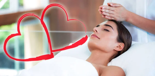 Woman receiving massage from masseur — Stock Photo, Image