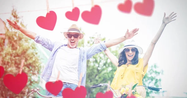 Excited couple with bicycles — Stock Photo, Image