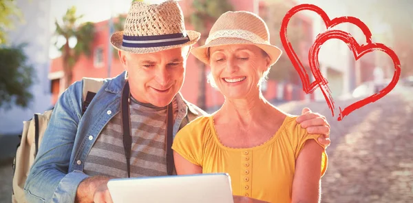 Couple using tablet pc — Stock Photo, Image